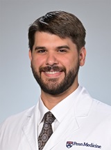 headshot of Adam M. Kruszewski, MD