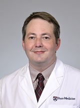 headshot of Jonathan J Miner, MD, PhD