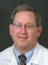 headshot of David M. Mintzer, MD