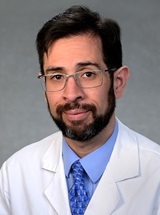headshot of Juan M. Ortega-Legaspi, MD, PhD