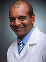 headshot of Vikram Palanivel, MD, PhD