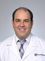headshot of Michael M. Rey, MD