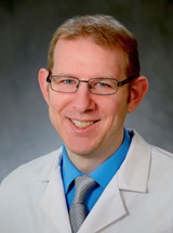 headshot of James Eric Schmitt, MD, PHD