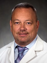 headshot of William R. Short, MD, MPH