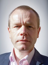 headshot of William Stewart, PhD, MBCHB