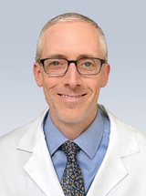 headshot of Joseph Teel, MD