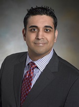 headshot of Amit Varma, MD, PhD