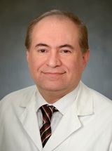 headshot of Arastoo Vossough Modarress, MD, PhD