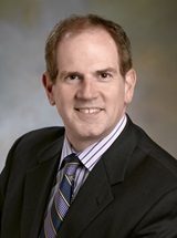headshot of David S. Warsaw, DO, MBA