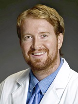 headshot of John James Wilson, MD