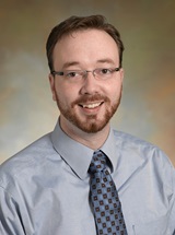 headshot of John C. Wood, MD, MBA, FAAFP