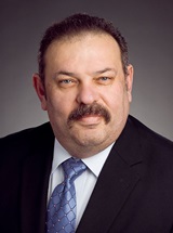 headshot of Anatoliy M. Yanovskiy, MD