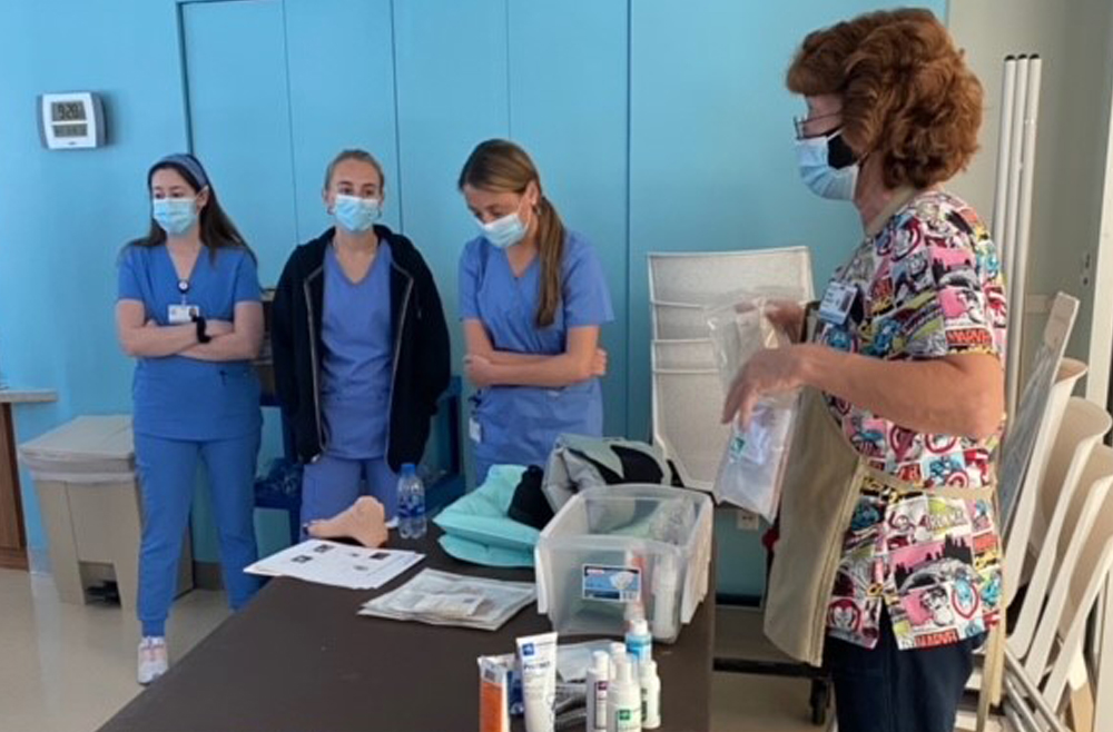 Connie Johnson, RN, wound ostomy nurse at Princeton Health, teaches during orientation session for nursing assistants and students