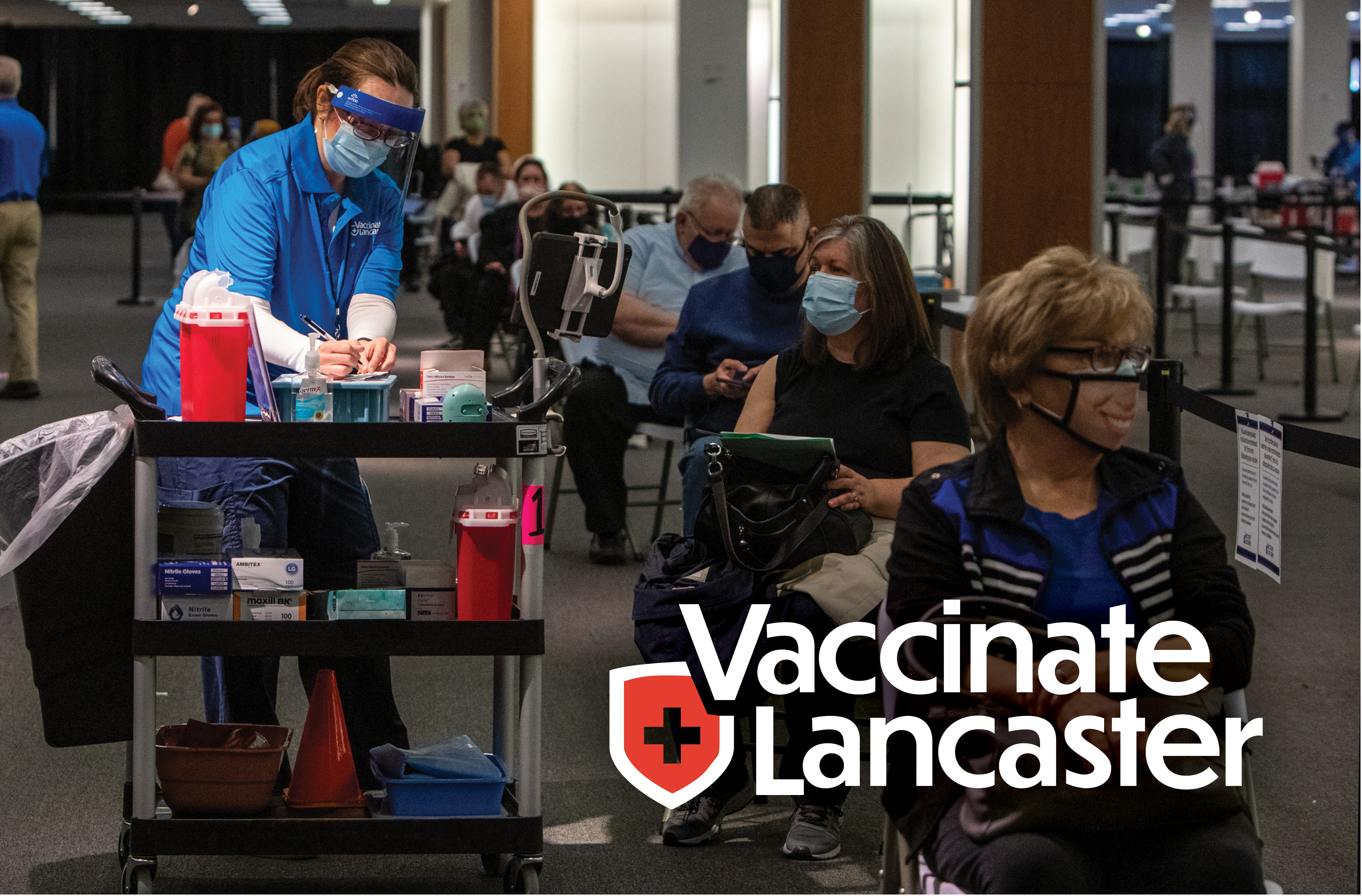 Lancaster community members at a COVID-19 vaccination center